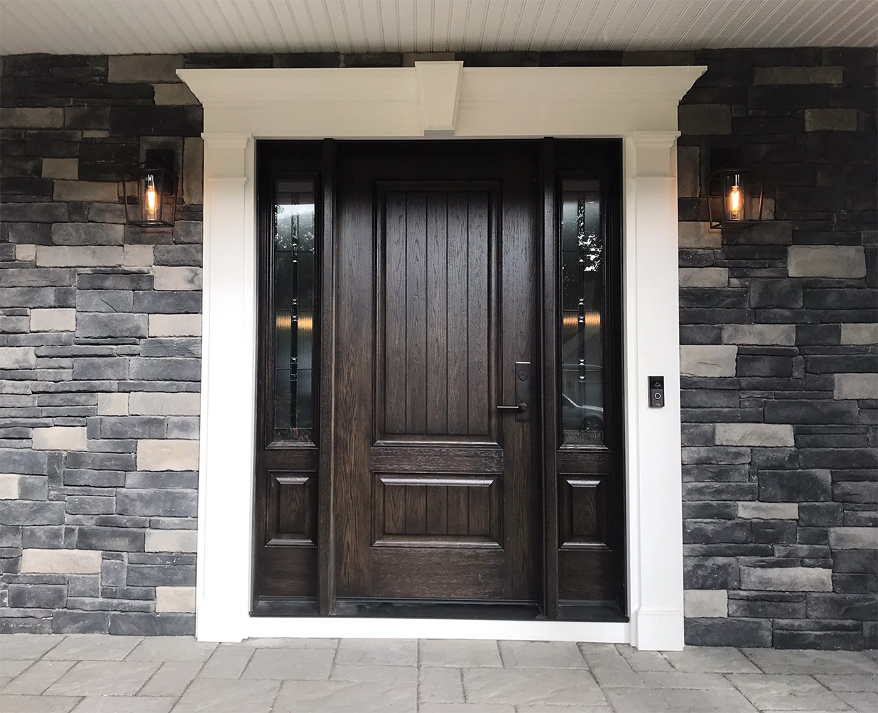 Full door replacement done on a house with stone siding in CT